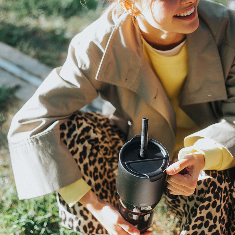 26oz-rise-tumbler-with-straw-lid-y4 26oz_rise_tumbler_black_woman_topview_square.jpg