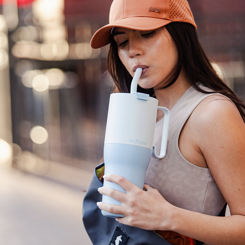 36oz-rise-tumbler-with-straw-lid-e9 36oz_rise_tumbler_straw_girl_sip_square.jpg