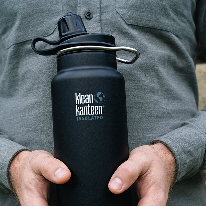 tkwide-chug-cap-i8 K32TKWSSL-SB-Craddled-Bottle_closeup_lifestyle.jpg